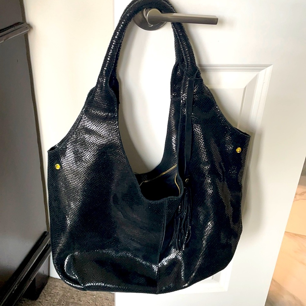 Maxine Couture black handbag.